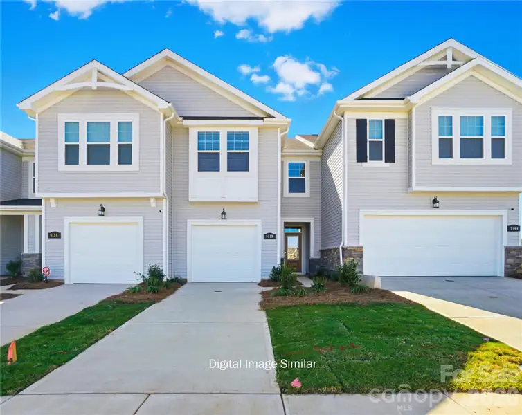 Front exterior of a new home in The Townes at Cheyney, Charlotte, NC, highlighting curb appeal (Image 1). Front exterior of a new home in The Townes at Cheyney, Charlotte, NC, highlighting curb appeal (Image 1).