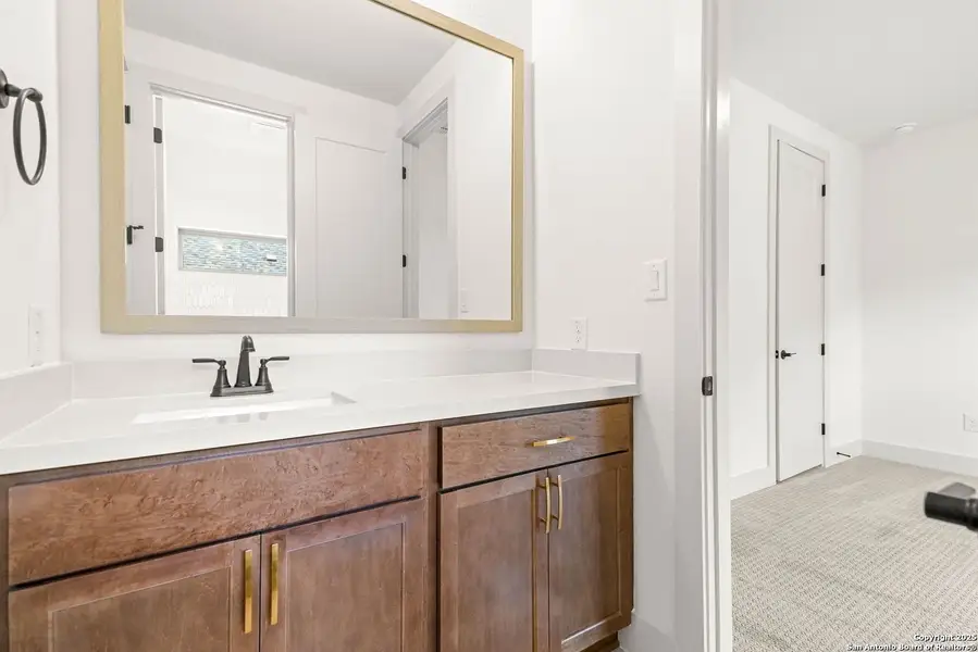 Furnished interior view inside a new home in Ventana - 70', Bulverde (Image 6).