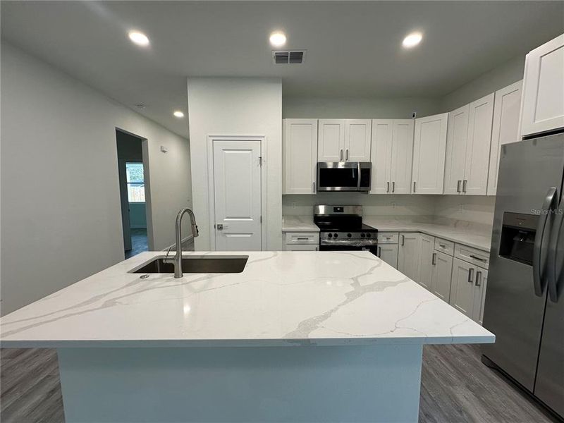 Furnished interior view inside a new home in , Apopka (Image 6).