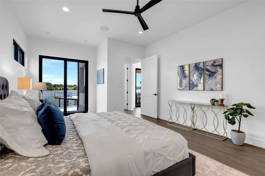 Bedroom featuring recessed lighting, wood finished floors, access to exterior, and ceiling fan