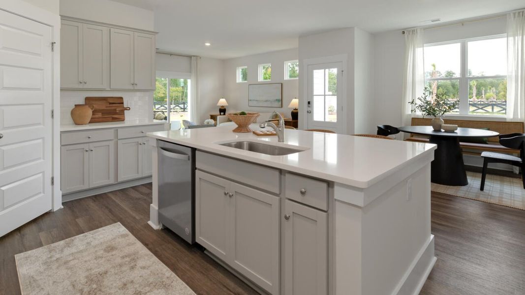 Representative furnished interior of a home built from the TUSCAN II by D.R. Horton in Indigo Preserve Townhomes, Leland (Image 7).