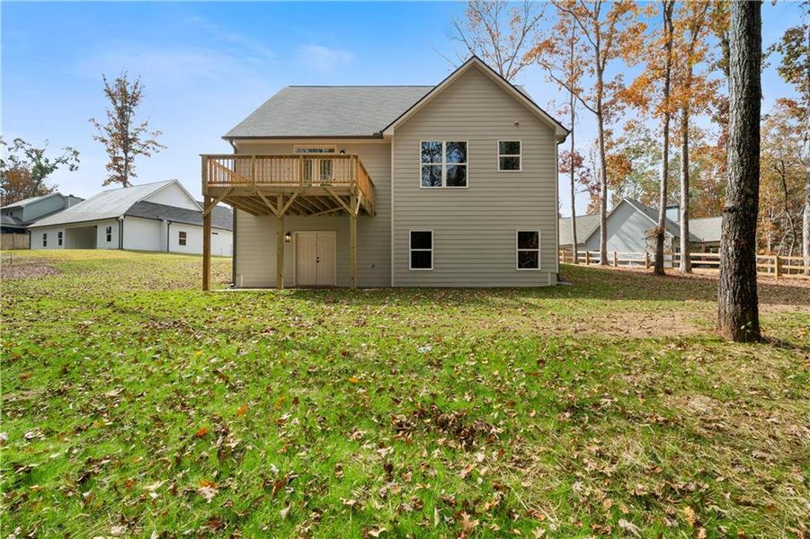 Front exterior of a new home in , Dallas, GA, highlighting curb appeal (Image 17).