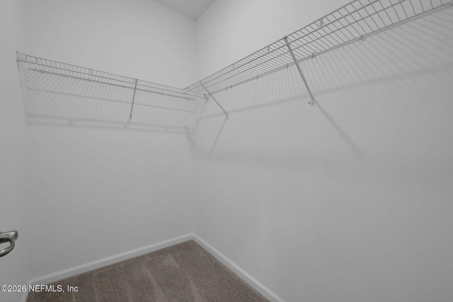 Spacious, unfurnished interior of a new home in Seminole Trace, Palm Coast (Image 26).