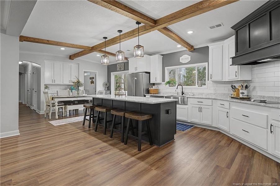 Granite countertops and tile backsplash