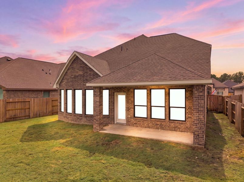 Exterior details and patio area of a home in The Trails, New Caney (Image 3).