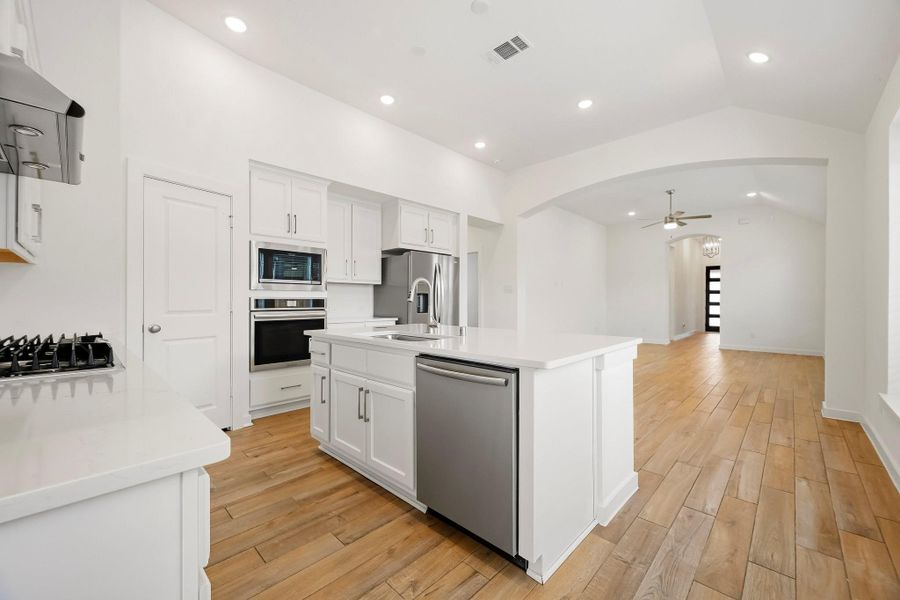 Furnished interior view inside a new home in Meridiana, Iowa Colony (Image 10).