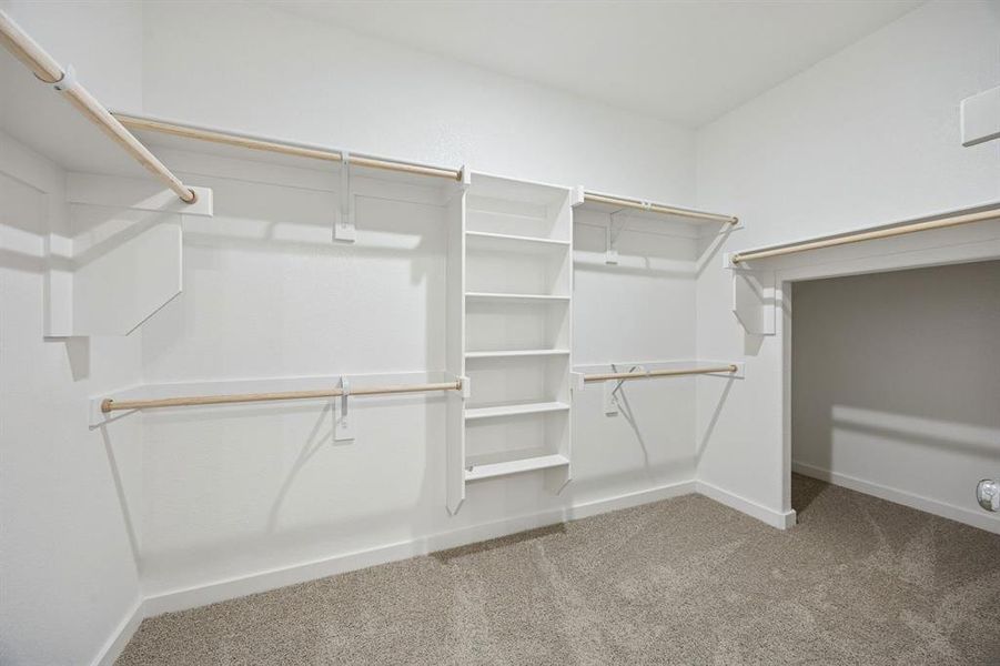 Primary Closet in the Stanley II home plan by Trophy Signature Homes – REPRESENTATIVE PHOTO