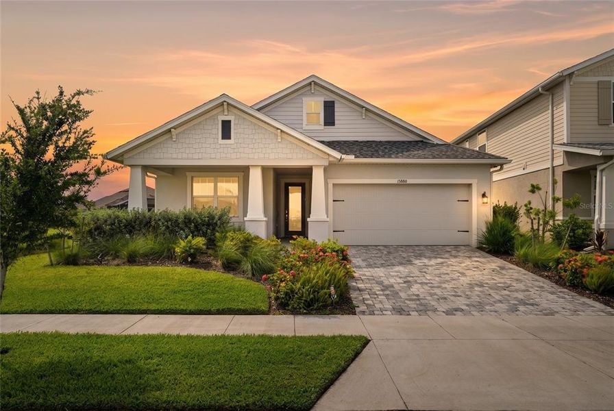 Front exterior of a new home in , Punta Gorda, FL, highlighting curb appeal (Image 2).