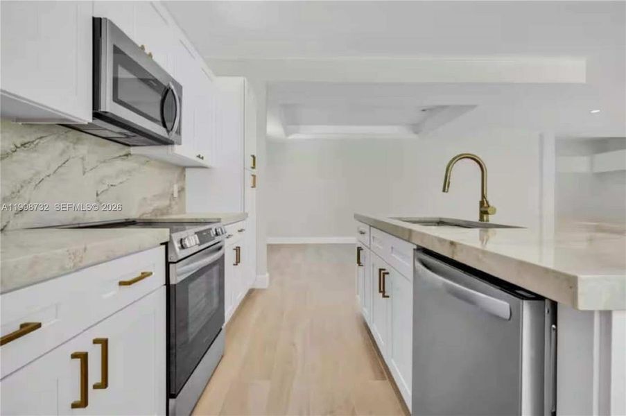 Furnished interior view inside a new home in , Boynton Beach (Image 12).