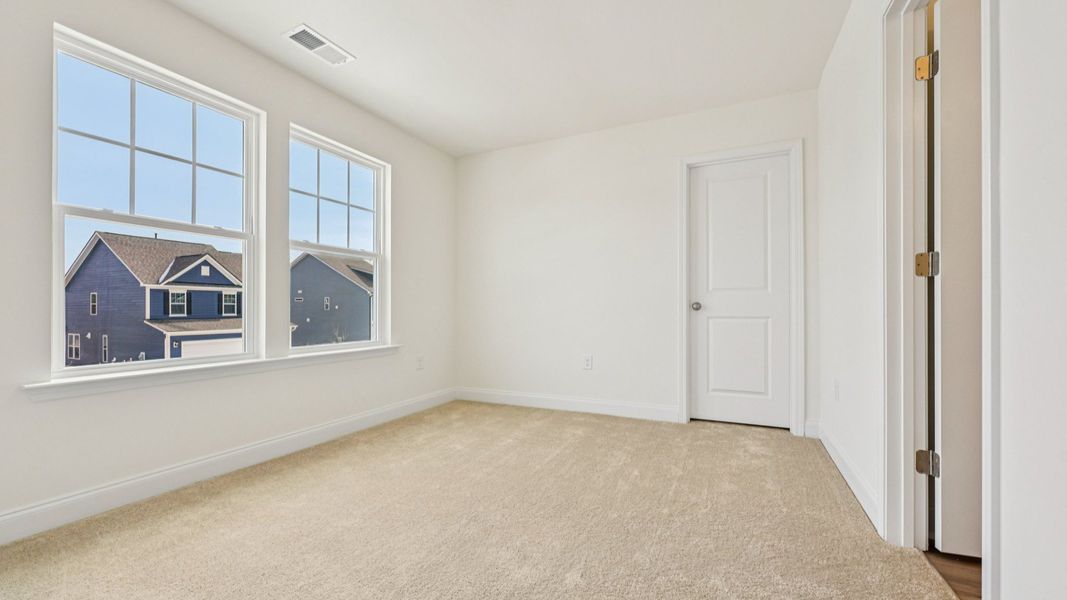 Representative furnished interior of a home built from the Merlot by DRB Homes in Station Pointe, Angier (Image 16).
