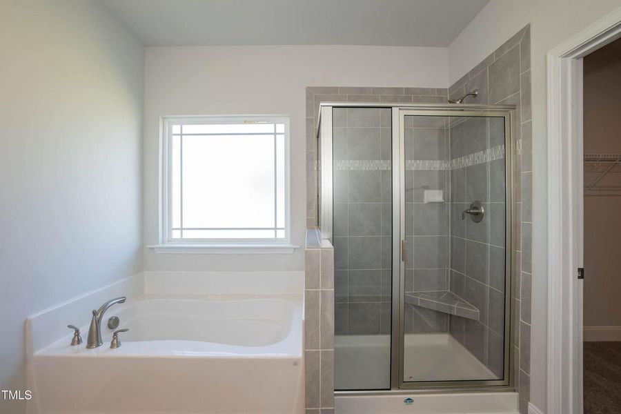 Furnished interior view inside a new home in Hidden Lake Estates, Greenville (Image 8).