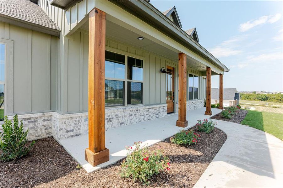 Super cute front flower beds. Super cute front flower beds.