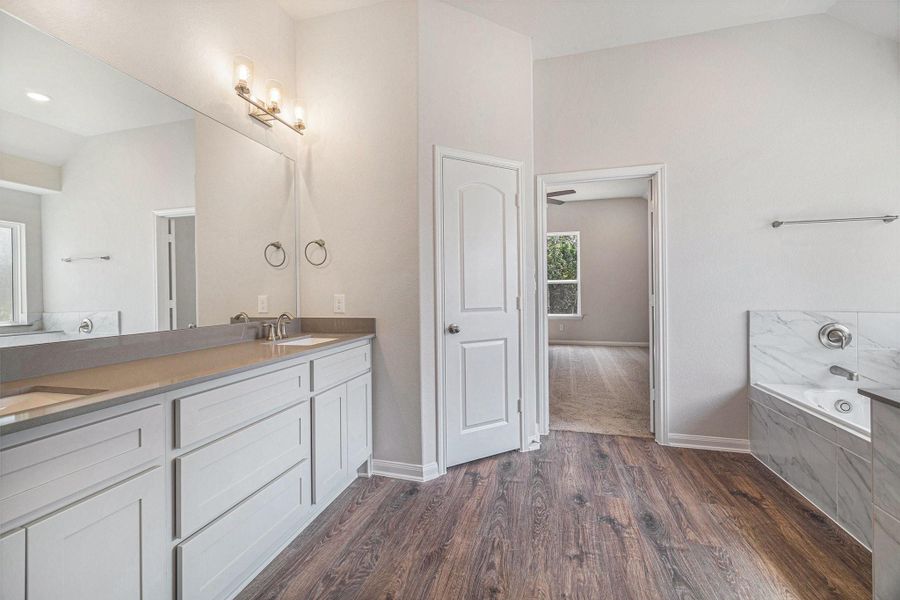 Furnished interior view inside a new home in Deer Pines, Conroe (Image 5).