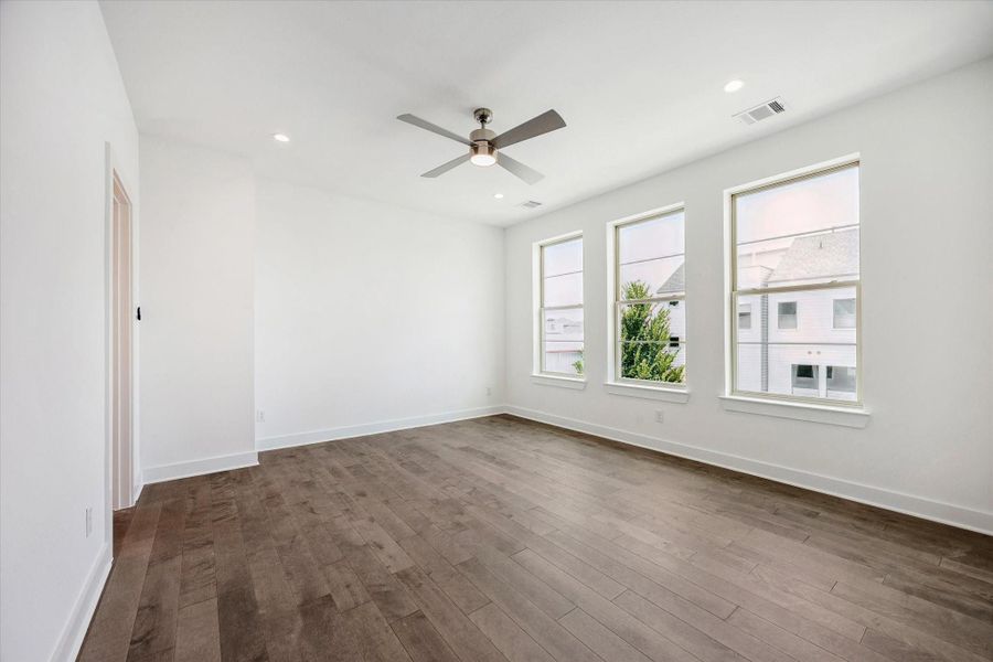 Primary Bedroom on the Third Floor * REAL Hardwood Floors * Recessed Lighting * Lots of Natural Light. Primary Bedroom on the Third Floor * REAL Hardwood Floors * Recessed Lighting * Lots of Natural Light.