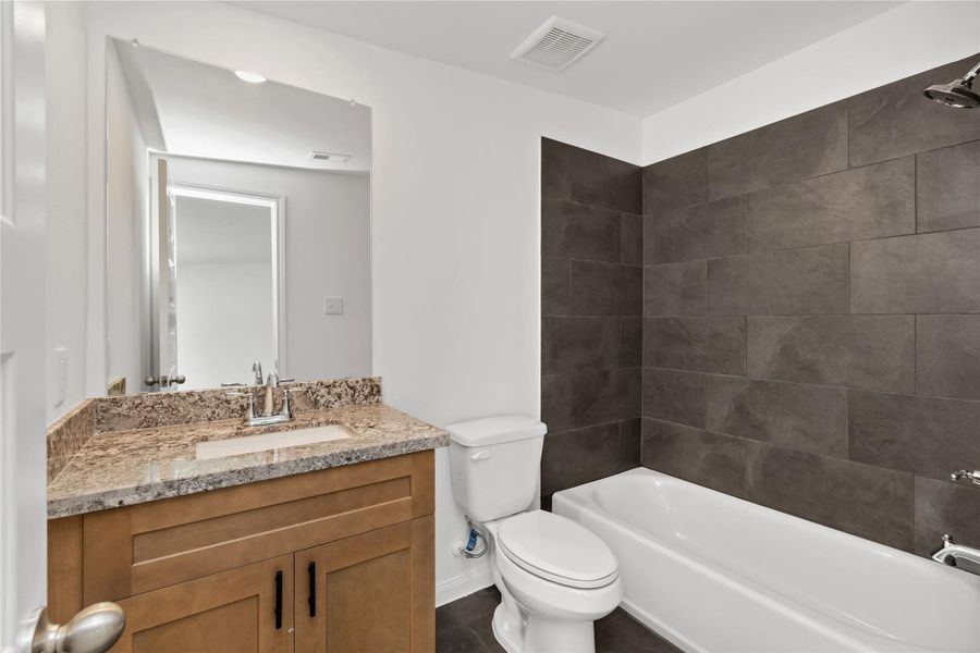 Furnished interior view inside a new home in Harmony Cove, Humble (Image 13).