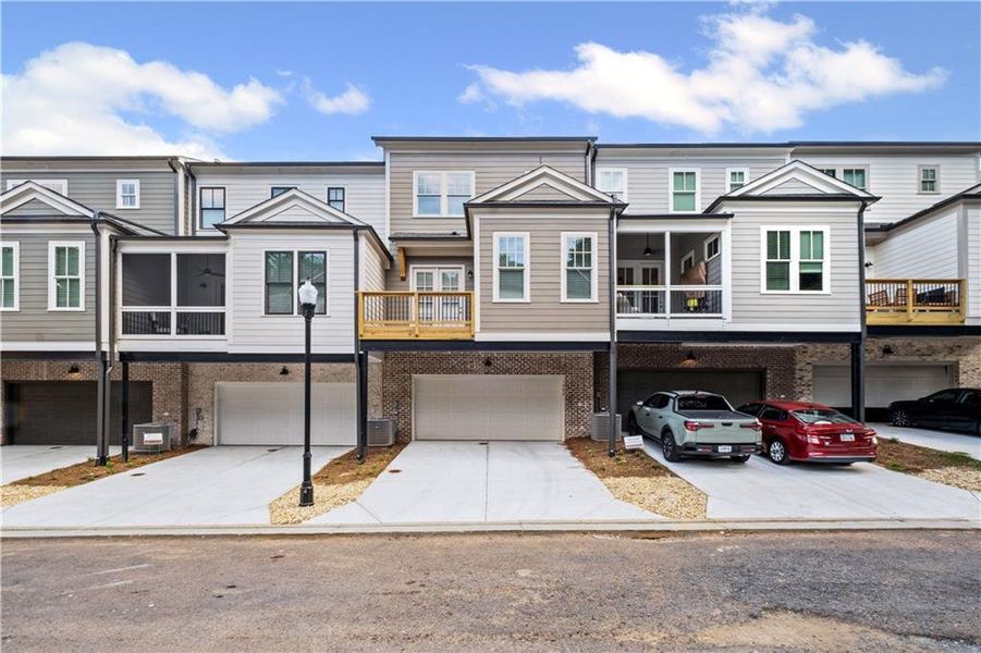 Front exterior of a new home in Devin's Shire - A Kennesaw Tradition, Kennesaw, GA, highlighting curb appeal (Image 20).