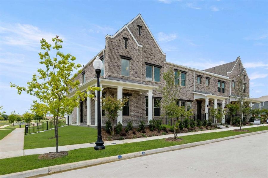 Front exterior of a new home in Parkside, Mansfield, TX, highlighting curb appeal (Image 25). Front exterior of a new home in Parkside, Mansfield, TX, highlighting curb appeal (Image 25).