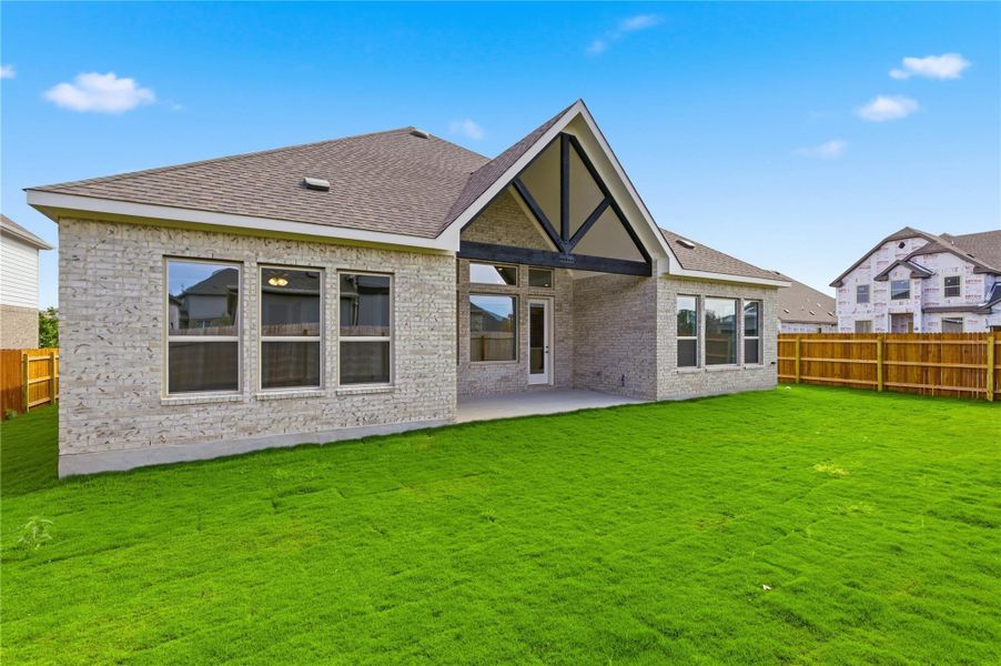 Exterior details and patio area of a home in Retreat at San Gabriel, Georgetown (Image 3).