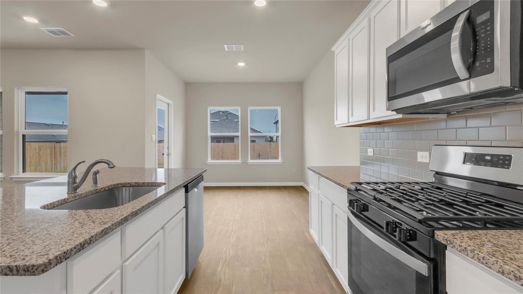 Furnished interior view inside a new home in Carillon, Manor (Image 5).