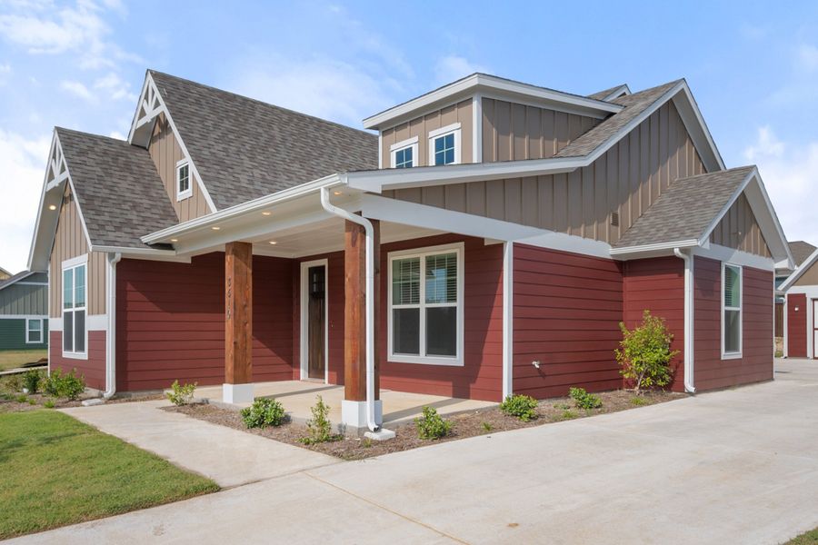 Front exterior of a new home in Heritage Towne, Midlothian, TX, highlighting curb appeal (Image 25). Front exterior of a new home in Heritage Towne, Midlothian, TX, highlighting curb appeal (Image 25).
