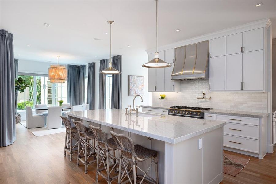 Gourmet eat-in kitchen with adjacent breakfast room