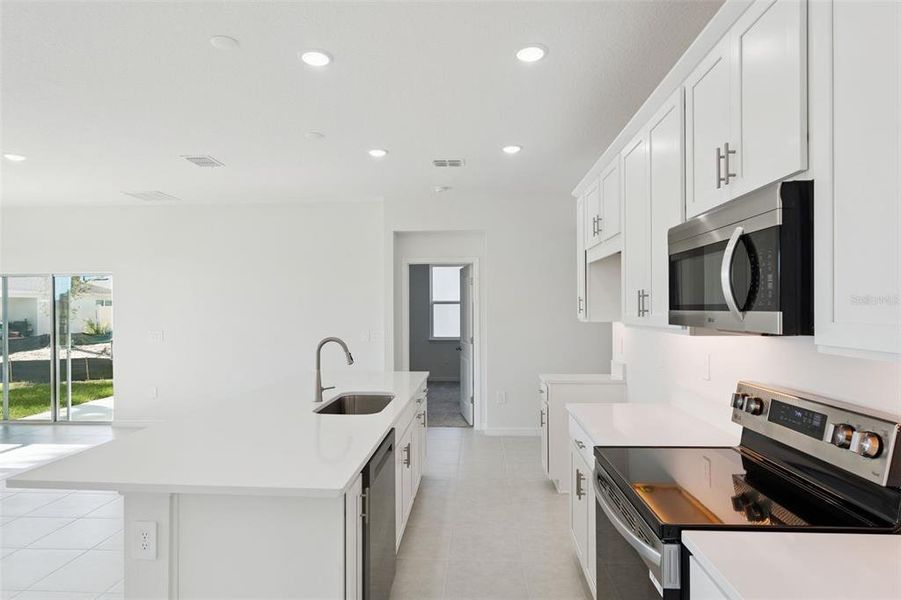 Furnished interior view inside a new home in Eden Crest, Apopka (Image 8).