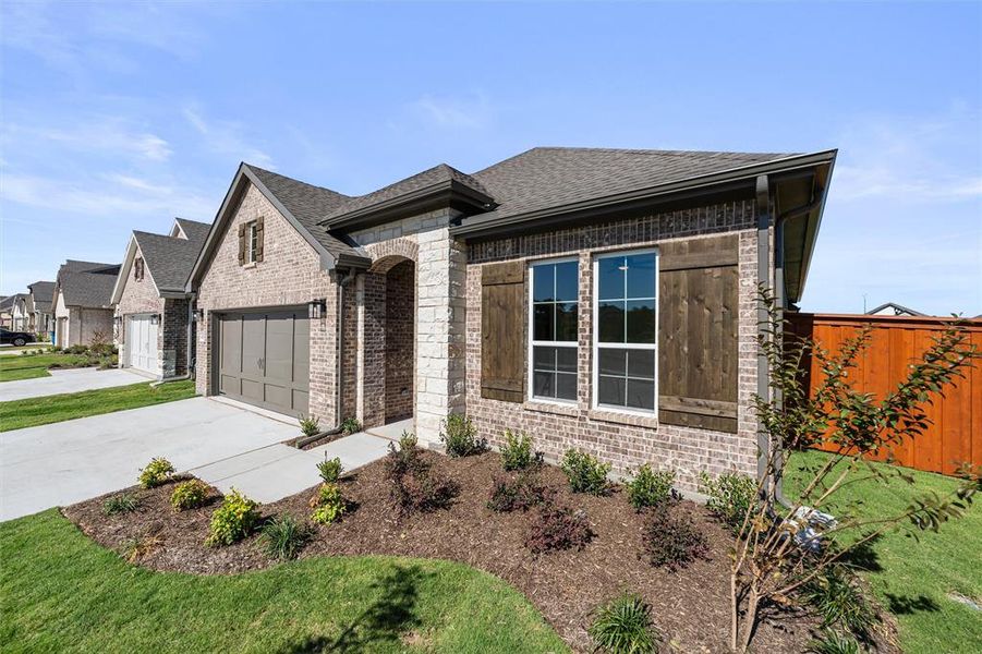 Exterior details and patio area of a home in Morningstar, Aledo (Image 19). Exterior details and patio area of a home in Morningstar, Aledo (Image 19).