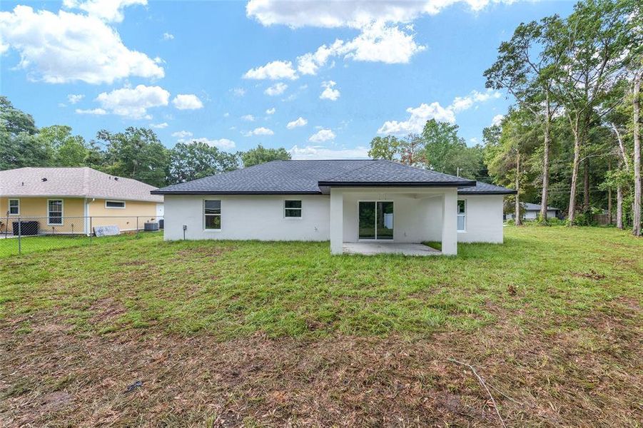 Exterior details and patio area of a home in , Ocala (Image 2).