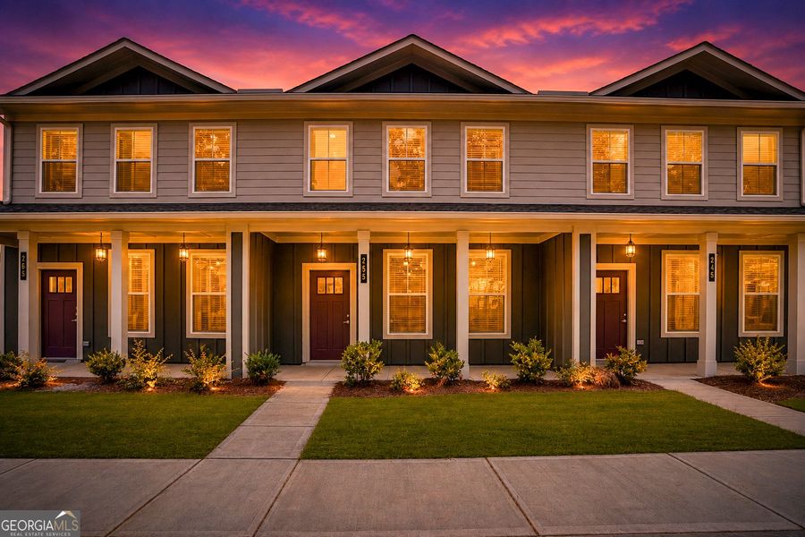 Front exterior of a new home in The Cottages at East Lanier, Fayetteville, GA, highlighting curb appeal (Image 13).