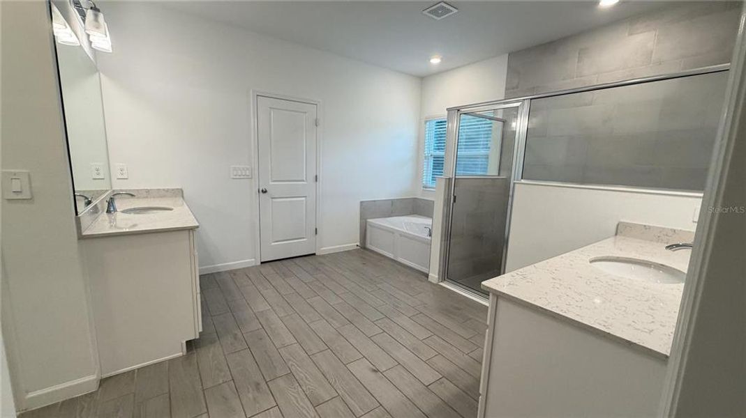 Furnished interior view inside a new home in Grand Park North, Dunnellon (Image 8).