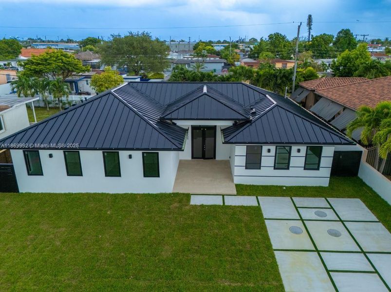 Front exterior of a new home in , Miami, FL, highlighting curb appeal (Image 27).