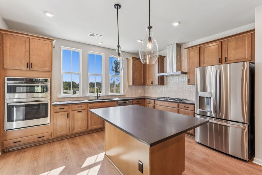 Representative furnished interior of a home built from the Isla by Tri Pointe Homes in Twinleaf Townes, Chapel Hill (Image 6).