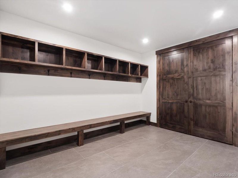 Lower level mudroom with custom built ins Lower level mudroom with custom built ins