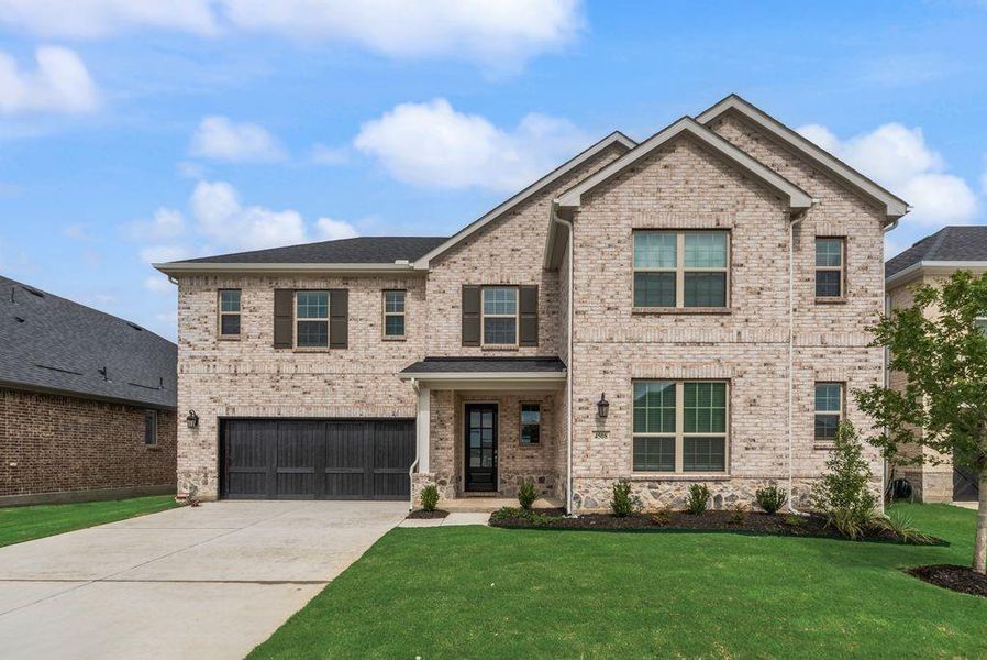 Front exterior of a new home in Sutton Fields, Celina, TX, highlighting curb appeal (Image 23).