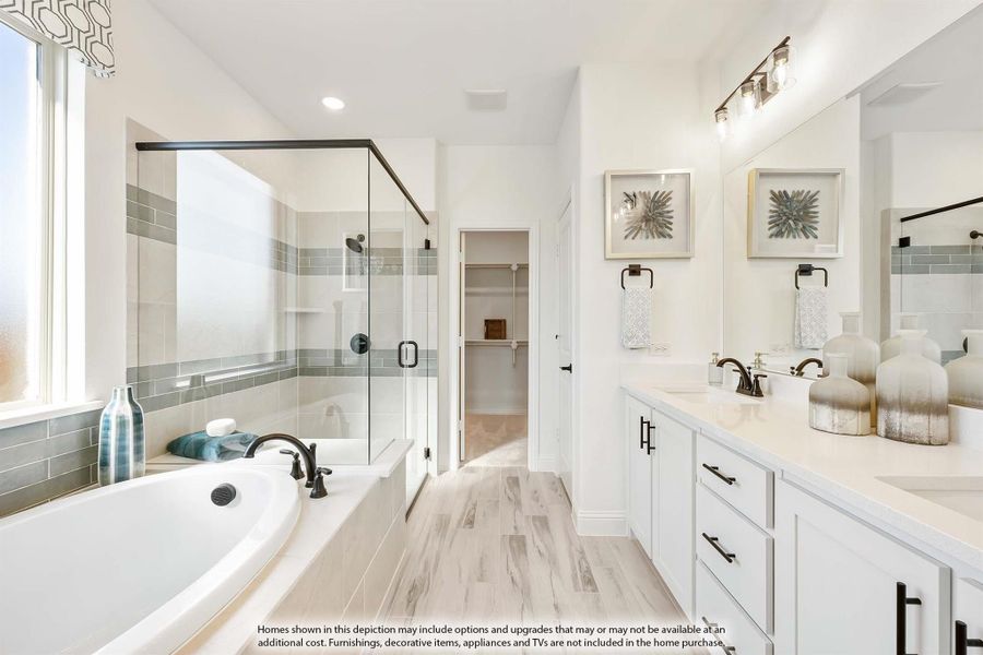 Master bathroom with soaking tub, glass walk-in shower, double vanity, and white cabinets with light wood floors Master bathroom with soaking tub, glass walk-in shower, double vanity, and white cabinets with light wood floors