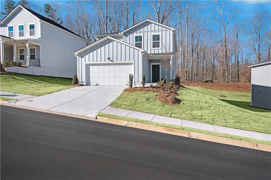 Front exterior of a new home in Avery Ridge, Gainesville, GA, highlighting curb appeal (Image 18). Front exterior of a new home in Avery Ridge, Gainesville, GA, highlighting curb appeal (Image 18).