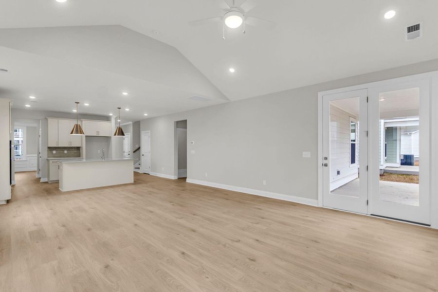 Spacious, unfurnished interior of a new home in Tidewater at Lakes of Cane Bay, Summerville (Image 42).