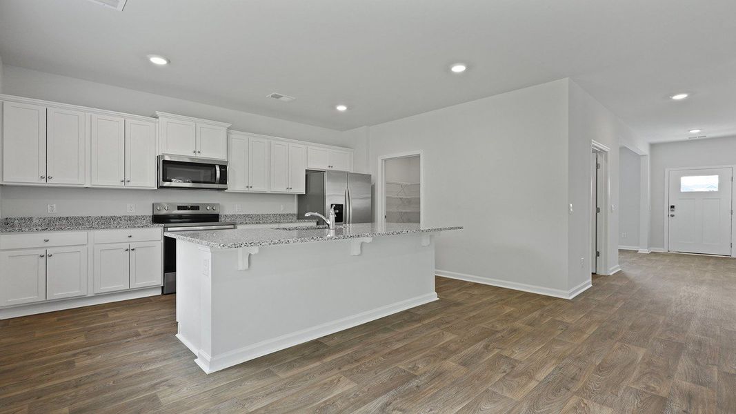 Furnished interior view inside a new home in The Ranch, Holly Hill (Image 10).
