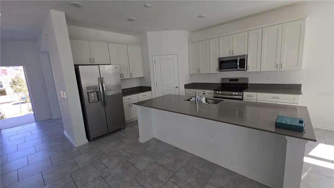 Furnished interior view inside a new home in Rhett's Ridge, Apopka (Image 7).