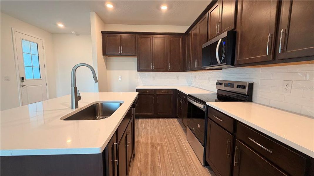 Furnished interior view inside a new home in Seaire, Parrish (Image 4).