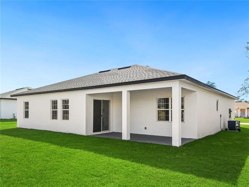 Exterior details and patio area of a home in , Ocala (Image 24).