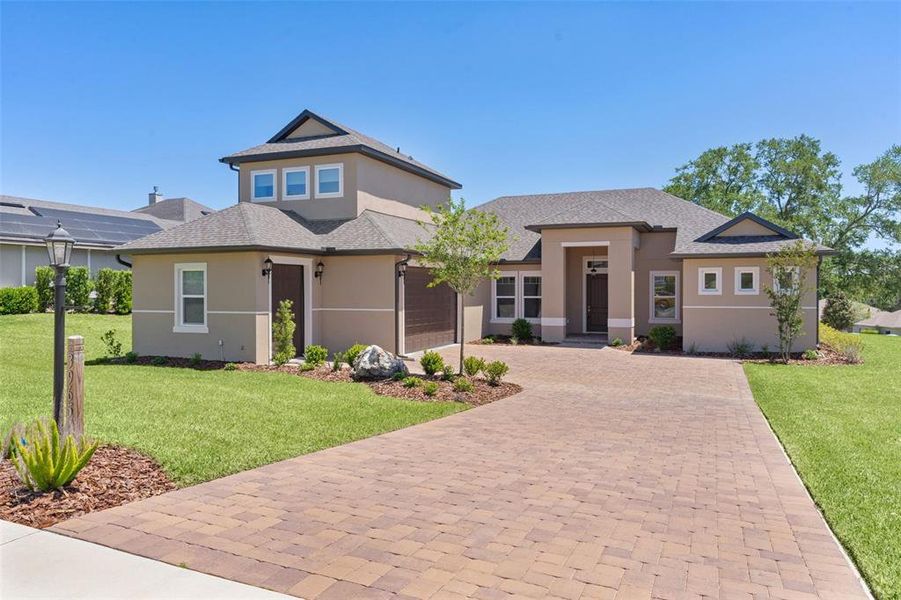 Front exterior of a new home in , Lady Lake, FL, highlighting curb appeal (Image 26).