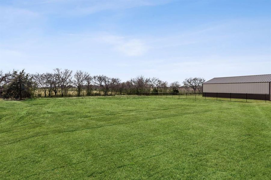 Exterior details and patio area of a home in Joshua Meadows, Joshua (Image 4).