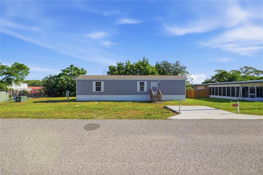 Exterior details and patio area of a home in , Brooksville (Image 21).
