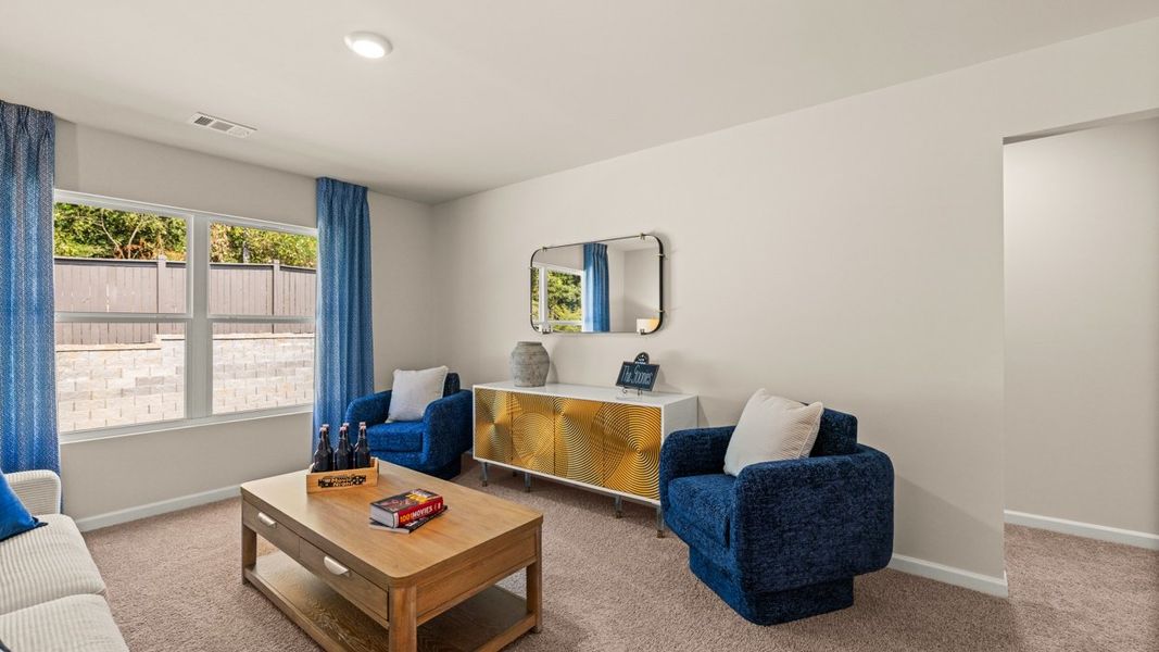 Representative furnished interior of a home built from the Halton by D.R. Horton in Brooks Station, Dacula (Image 28).