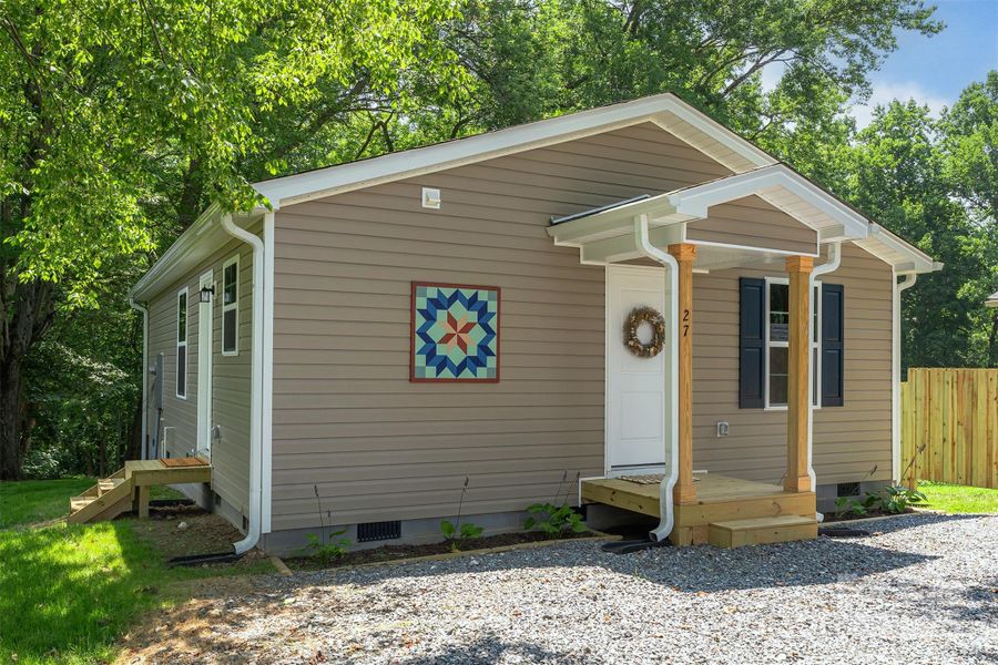 Front exterior of a new home in , Marion, NC, highlighting curb appeal (Image 17).