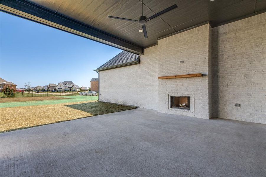 View of patio with ceiling fan