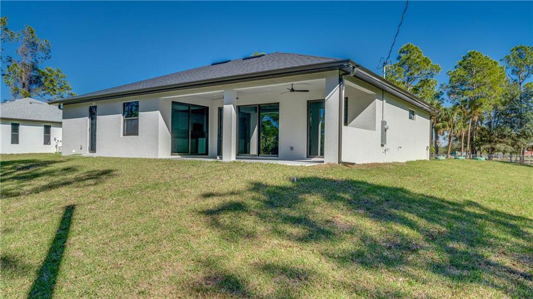Exterior details and patio area of a home in , Lehigh Acres (Image 31). Exterior details and patio area of a home in , Lehigh Acres (Image 31).