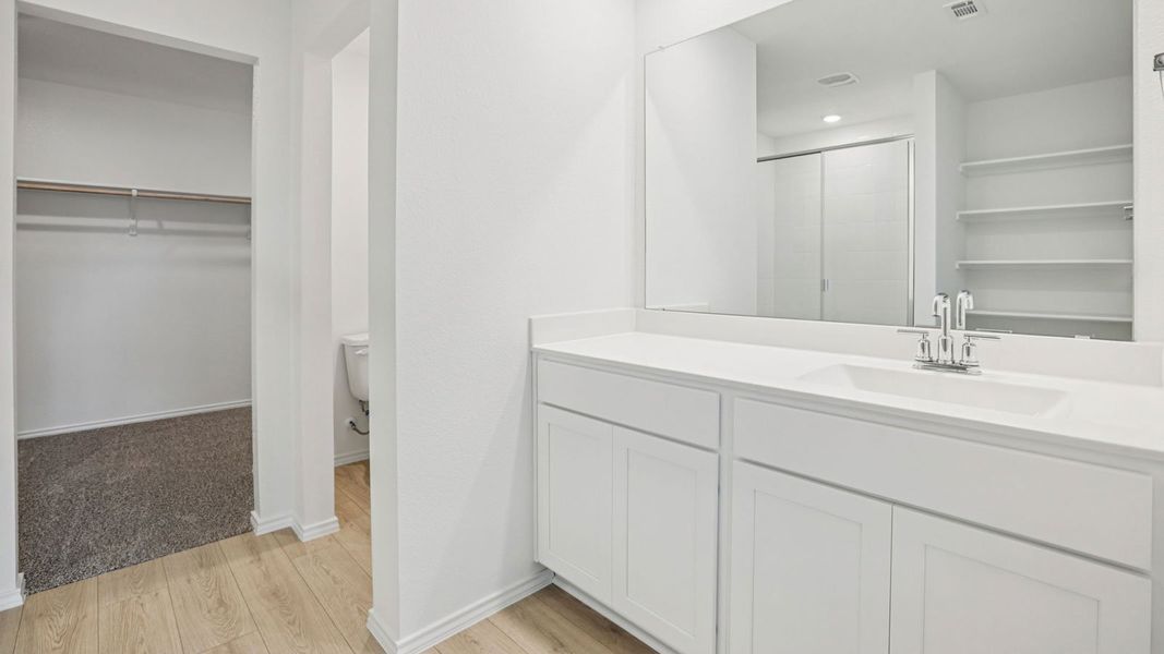 Furnished interior view inside a new home in Carillon, Manor (Image 9).