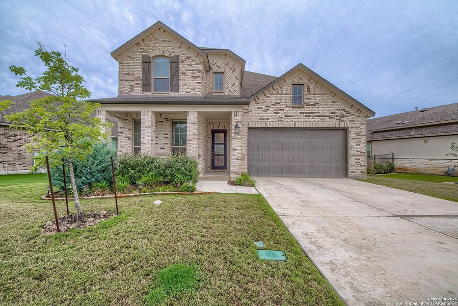 Front exterior of a new home in Regent Park, Boerne, TX, highlighting curb appeal (Image 19).